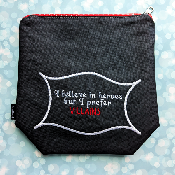 I believe in heroes, but I prefer villains, small zipper Bag