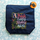 A Book a day Keeps reality away, small zipper Bag