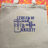 Fueled by iced coffee and anxiety, Tall Tote Bag